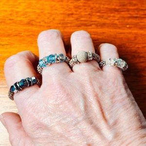 Women’s set of four adjustable/stretchy Silver Rings